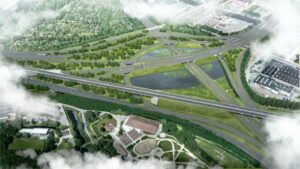 Impressie knooppunt Amstel met snelwegen in groene omgeving vanuit de lucht