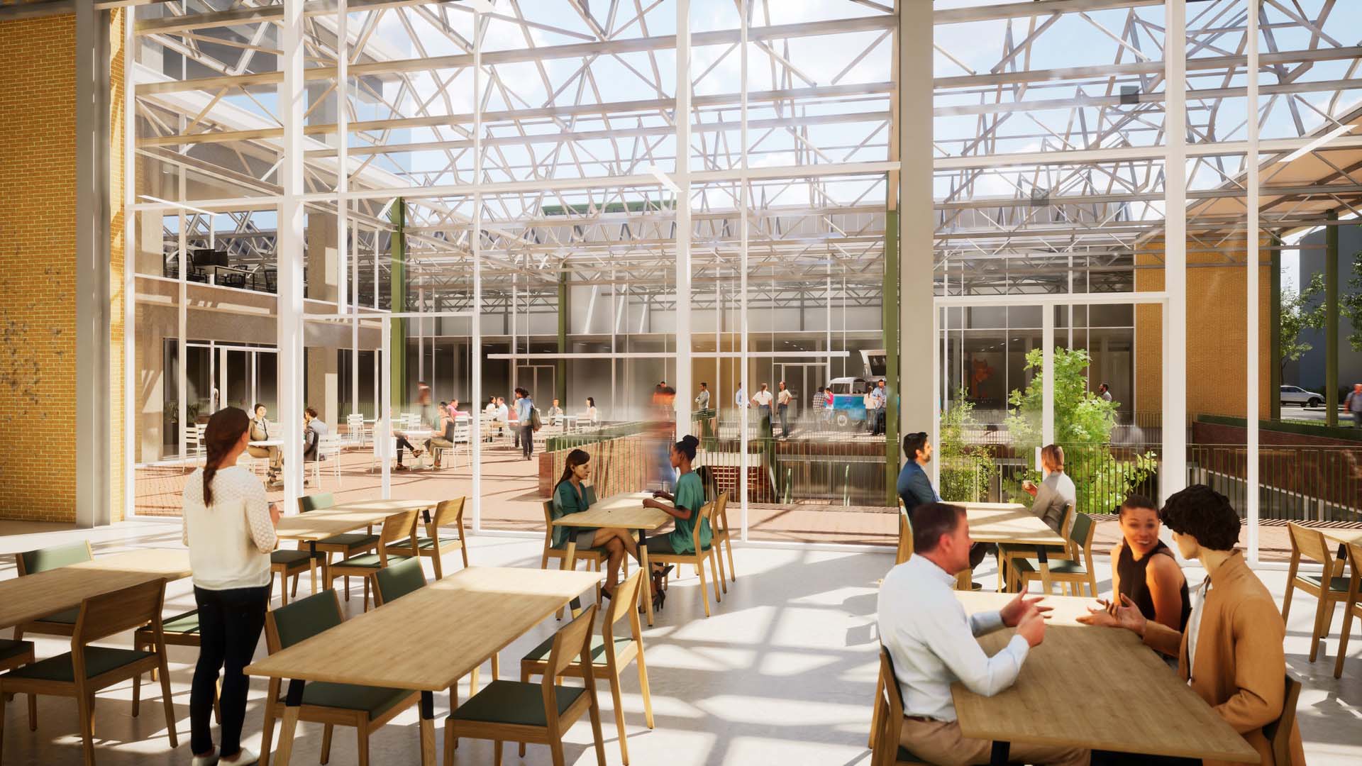 Kantine in atrium kantoorgebouw met glazen dak